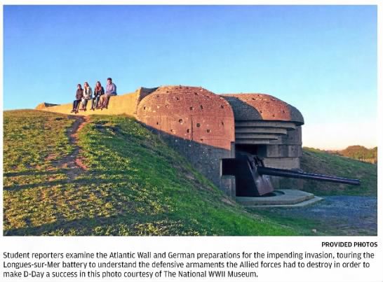 Student reporters examine the Atlantic Wall